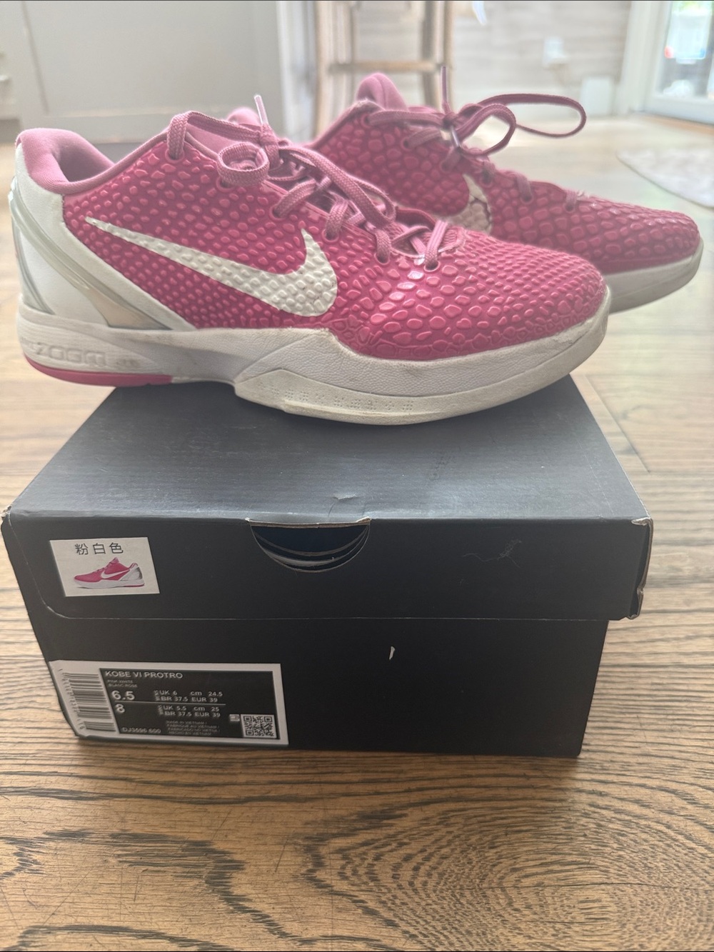 Nike Pink Low-Top Basketball Sneakers with White Swoosh